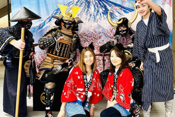 Mami and Yuko with performers